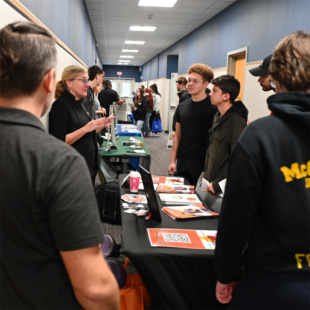  EMCC students talk to RIT at the Career Expo.